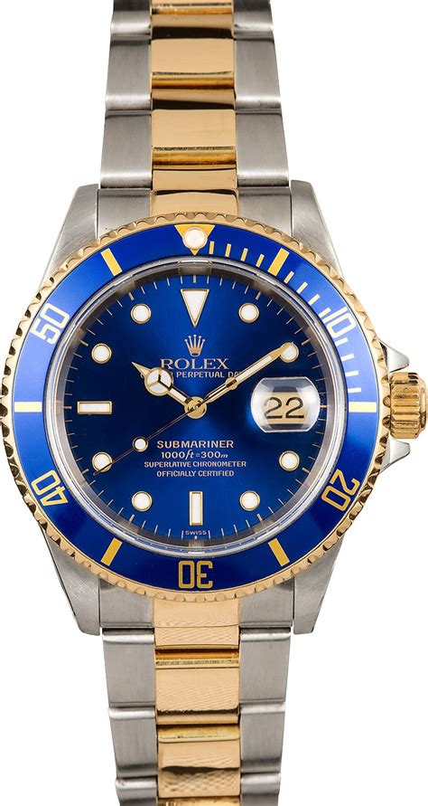 blue faced Rolex watch